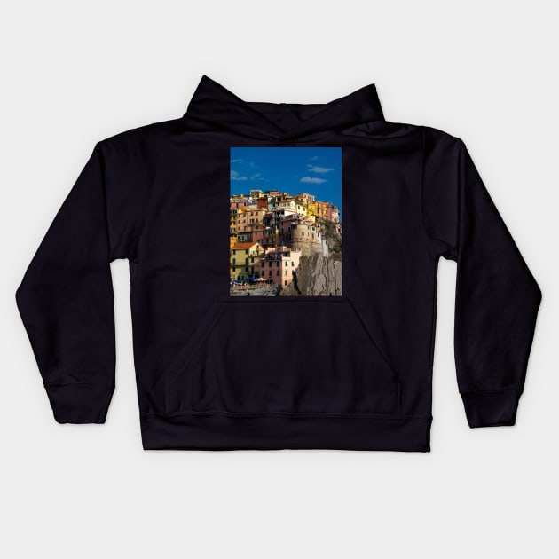 View on the cliff town of Manarola, one of the colorful Cinque Terre on the Italian west coast Kids Hoodie by Dolfilms